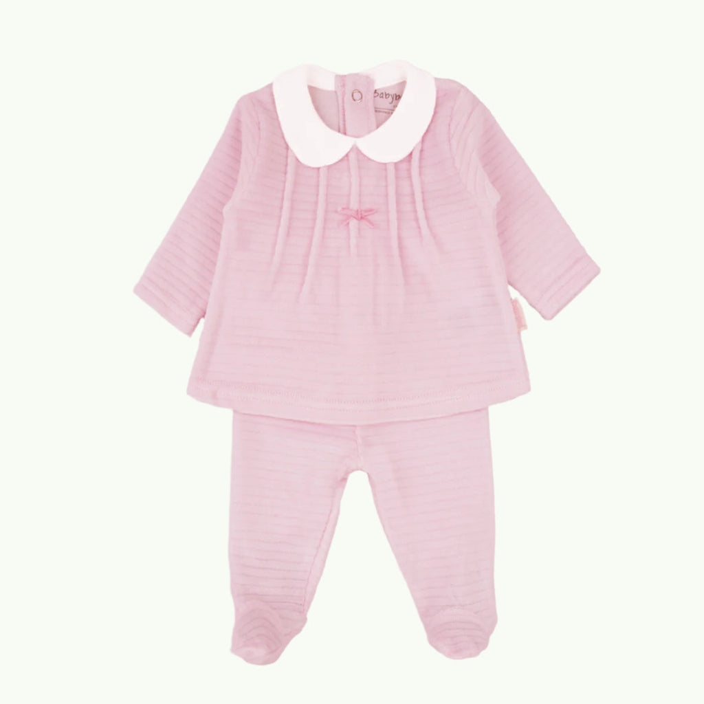 Pink baby outfit with white collar on a white background