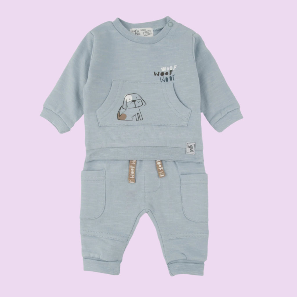 Light blue baby outfit with long-sleeve top and pants on a white background
