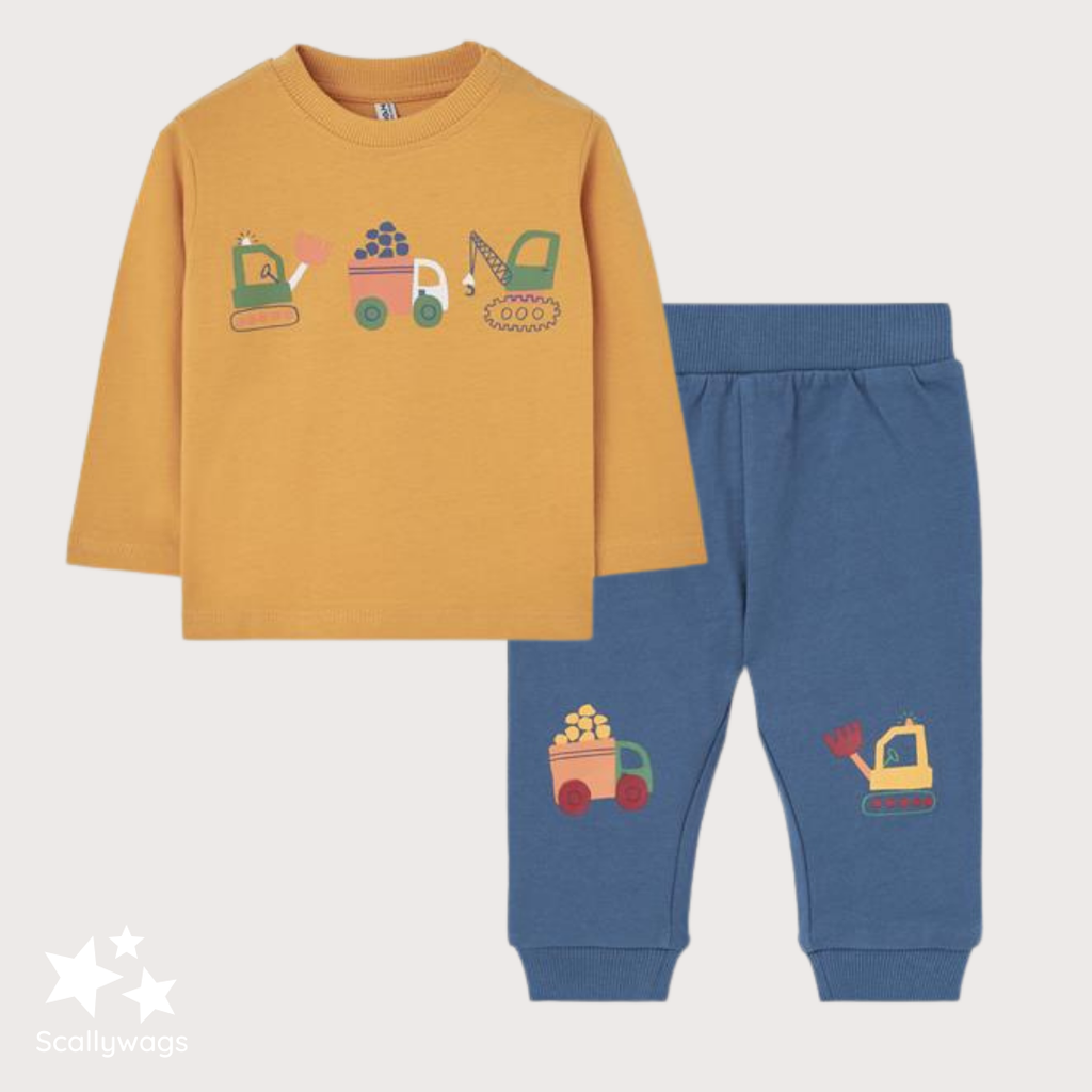 baby outfit with mustard yellow long-sleeve shirt and blue pants featuring construction vehicle designs on a light background.