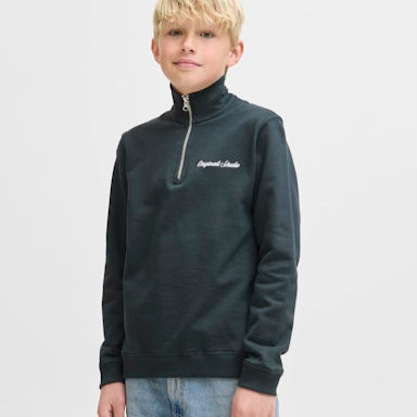 Child wearing a dark grey sweatshirt with a brand logo on a light  background