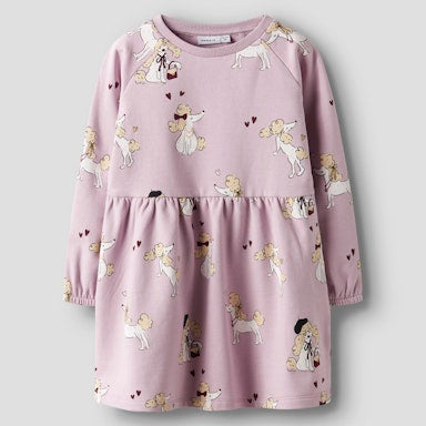 lilac dress with poodle dog pattern all over on a grey background