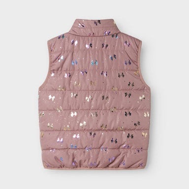Pink puffer vest with bow pattern on a white background