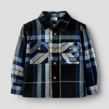 Checked shirt with a mix of blue, black, and grey colours on a light  background