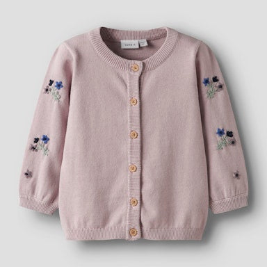 Pink cardigan with floral embroidery on a light  background
