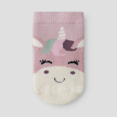 Children's sock with unicorn design on a light background