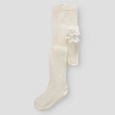 cream tights with lace details on a light  background
