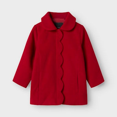 Red girls coat on a light  background