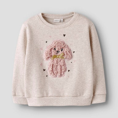 Beige sweatshirt with a pink poodle design on a light grey background