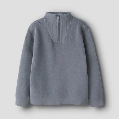 Blue knit jumper pullover on a light  background