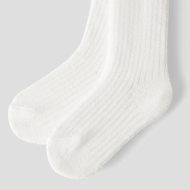 White tights on a light grey background