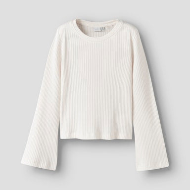 White ribbed sweater on a light  background