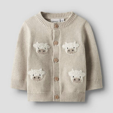 neutral coloured baby cardigan with 4 white cow faces embroidered on the front 