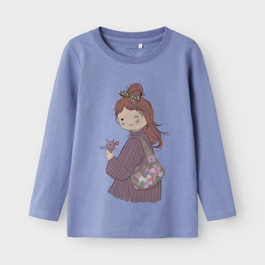 Blue long-sleeve shirt with a graphic of a girl holding flowers on a light  background