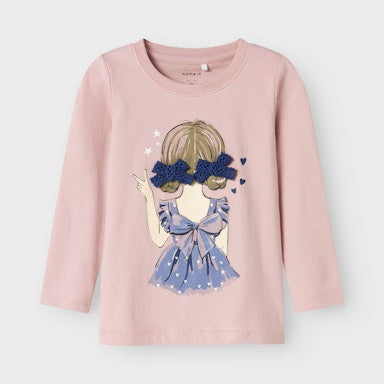 Pink long-sleeve shirt with a graphic design on a light  background