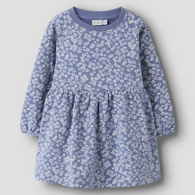Blue floral dress on a light  background