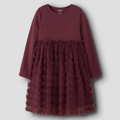 Maroon dress with lace details on a light  background