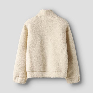 Back view of a  beige sherpa teddy on a light  background