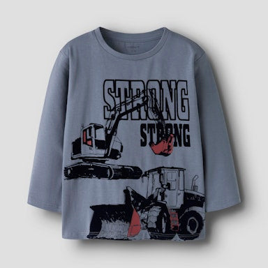 Children's blue long-sleeve shirt with construction vehicle graphic and 'STRONG' text on a light  background
