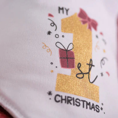 Baby bib with 'My 1st Christmas' design 