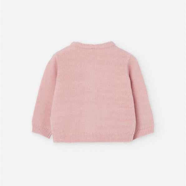 Pink sweater on a white background