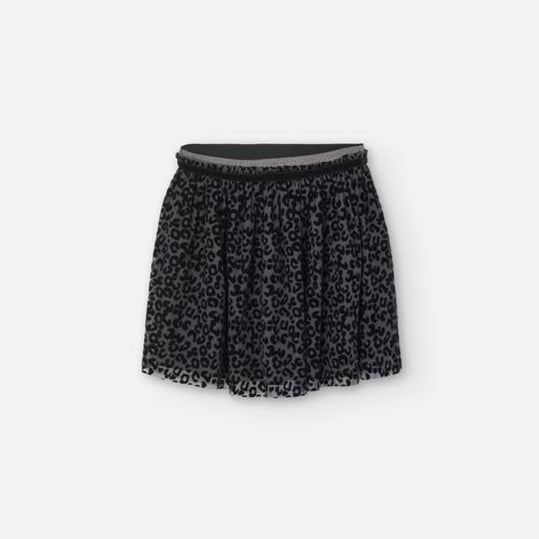 Black patterned skirt on a white background